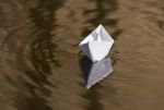 Paper Boat Floating In The Creek Stock Photo