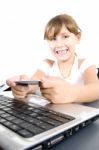 Smiling Girl With Laptop And Credit Card Stock Photo