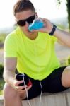 Handsome Young Man Drinking After Running Stock Photo