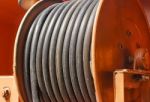 Large Metal Coil With Electric Cable Stock Photo