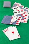 Poker  Cards On Green Baize Casino Stock Photo