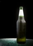 Cool Beer Bottle On Table Stock Photo