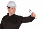 Handyman Wearing Uniform And Hardhat Stock Photo