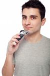 Young Man Shaving Stock Photo