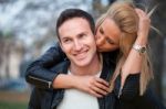 Young Couple In Park Stock Photo