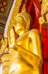 Golden Buddha Statue In The Church Stock Photo