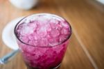 Fresh Juices With Fruits On Wooden Table Stock Photo