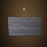 Empty Wooden Sign Hanging Stock Photo