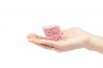 Woman's Hand Holding Steamed Cake Stock Photo