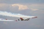 Virgin Atlantic Boeing 747-400 And Red Arrows Aerial Display At Stock Photo