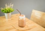 Iced Cofee Mocha Drink Serving On Wooden Table Stock Photo