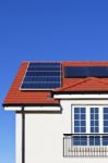 House Roof Covered With Solar Panel Stock Photo