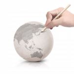 Shade Drawing Asia Map On Paper Ball Stock Photo