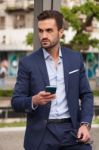 Businessman Talking On The Phone Stock Photo