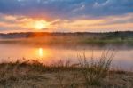 Misty Summer Sunrise. Foggy River In The Morning. Misty Morning Stock Photo