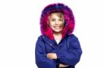 Excited Young Girl In Winter Wear Stock Photo