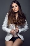 Portrait Of Pretty Young Woman Posing In The Studio Photo Stock Photo