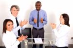 Multi Ethnic Team During Meeting Stock Photo