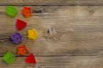 Colorful Shape On Woody Background	 Stock Photo