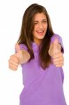 Teenage Girl Winking With Thumbs Up Stock Photo