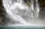 Waterfall At Milford Sound Stock Photo