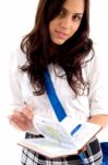 Young High School Female With Study Material Stock Photo