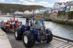 Launching The Lifeboat At Staithes North Yorkshire Stock Photo