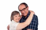 Senior Couple Hugging Each Other Stock Photo