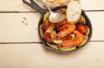 Roasted Shrimps With Zucchini And Tomatoes Stock Photo