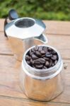 Roasted Coffee Beans In Moka Pot Stock Photo