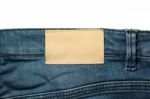 White Leather Label On Jeans Isolated On White Stock Photo