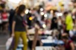 Blurred People Walking On The Street Stock Photo