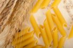 Italian Pasta Penne With Wheat Stock Photo