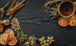 Dried Herbs And Ginseng, Top View Of Thai Herbs And Ginseng On Wooden Floor Stock Photo