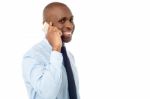 Male Executive Busy On Phone Call Stock Photo