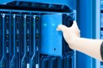 Man Fix Server Network In Data Center Room Stock Photo