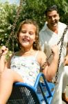 Sweet Girl On Swing Stock Photo