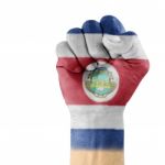 Costa Rica Flag On Hand Stock Photo