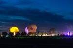 Hot Air Ballons And Tents In The Evening During A Festival Stock Photo