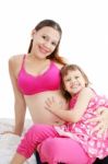 Pregnant Woman With Her Daughter Stock Photo