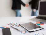 Laptop With Tablet And Smart Phone On Table Stock Photo