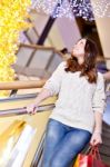 Beautiful Young Woman Holding Shopping Bags Stock Photo