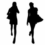 Silhouettes Of Fashion Women Stock Photo