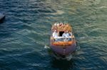 Motorboat Cruising Down The Grand Canal In Venice Stock Photo