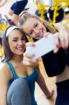 Young Women Taking A Selfie In The Gym Stock Photo