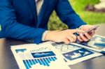 Handsome Businessman Wearing Suit And Using Modern Laptop Outdoo Stock Photo