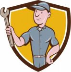 Handyman Holding Spanner Crest Cartoon Stock Photo