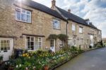 Row Of Honey Coloured Houses In Witney Stock Photo