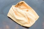 Close Up Of Yellow Chamois (microfiber Towel) On Car Stock Photo