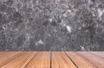 Top Of Wood Table On Old Concrete Wall Background Stock Photo